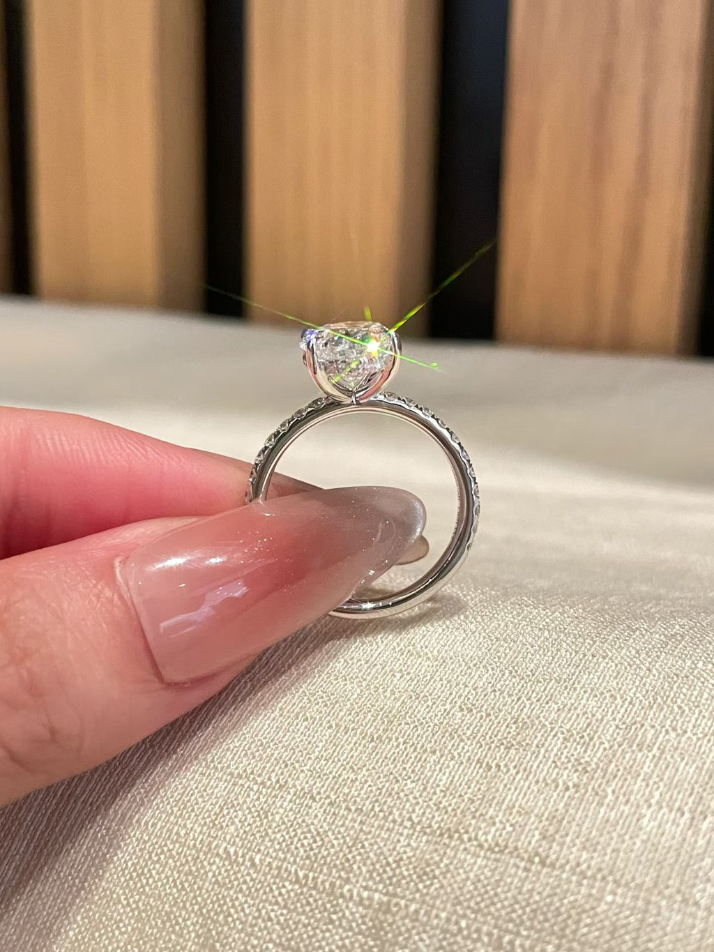 3 ct oval lab-grown diamond four-prong ring with pavé band, view 2