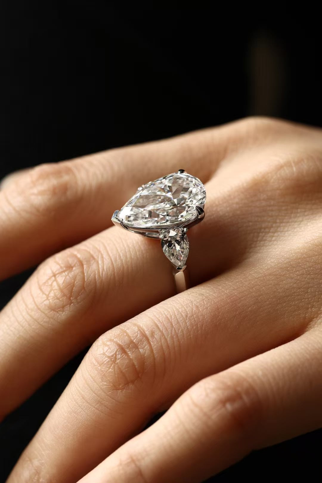6 carat pear-cut lab-grown diamond three-stone ring in platinum