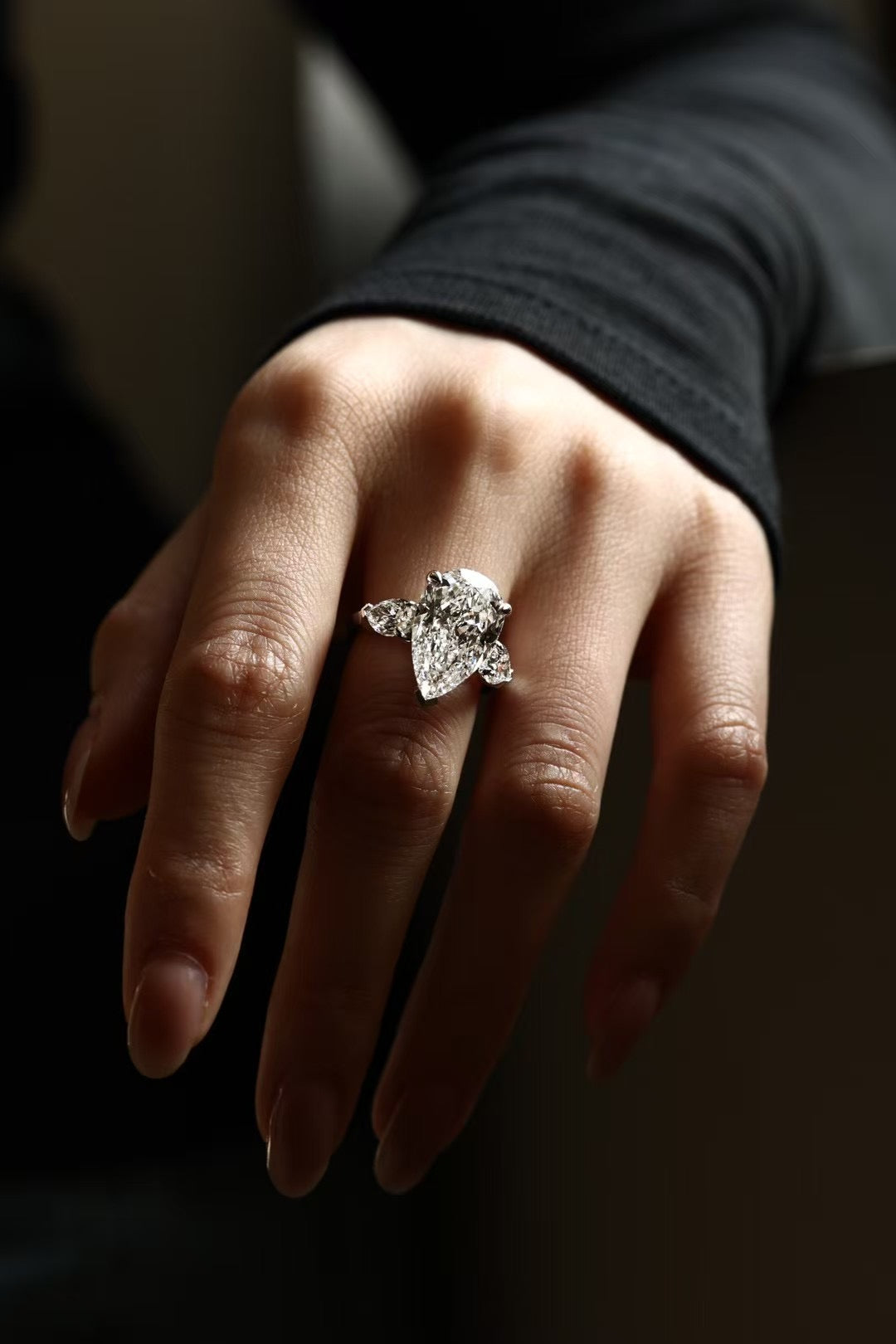 6 carat pear-cut lab-grown diamond three-stone ring in platinum