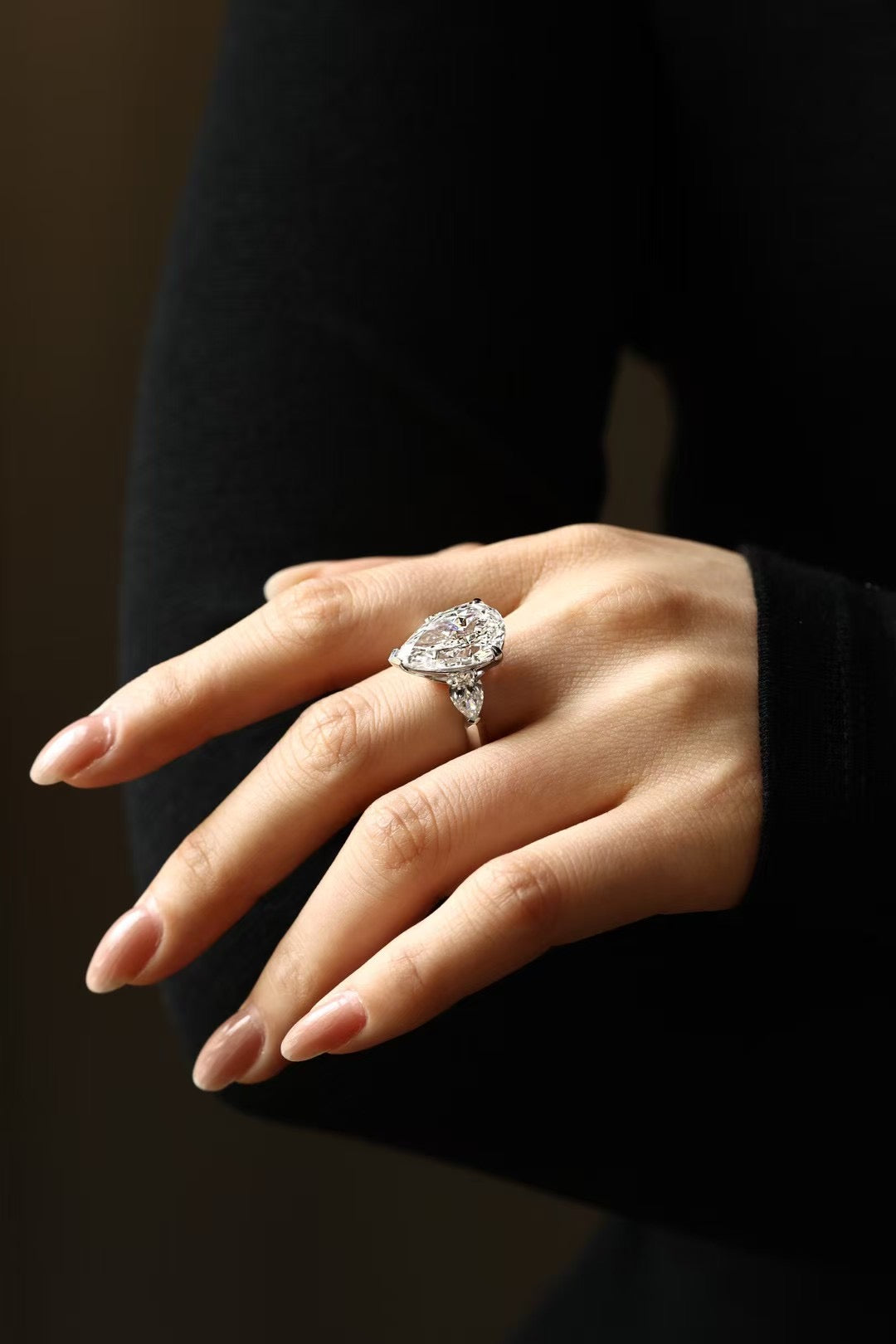 6 carat pear-cut lab-grown diamond three-stone ring in platinum