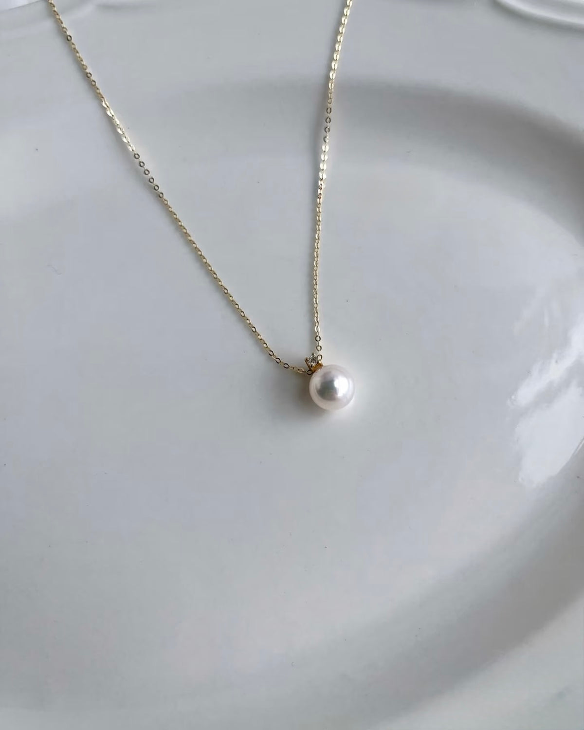 Japanese Akoya pearl and natural diamond necklace with 14K yellow gold chain