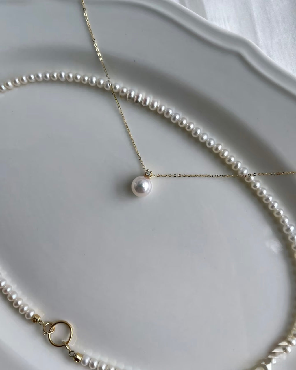 Japanese Akoya pearl and natural diamond necklace with 14K yellow gold chain