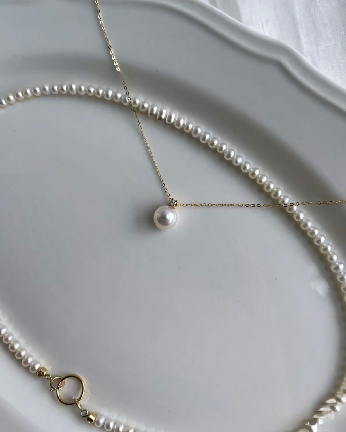 Japanese Akoya pearl and natural diamond necklace with 14K yellow gold chain