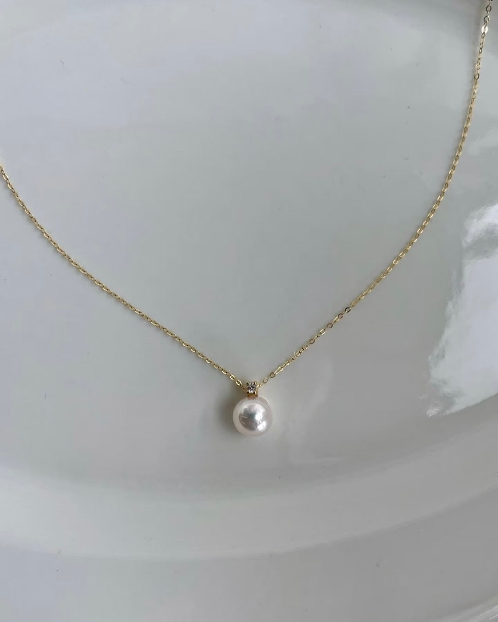 Japanese Akoya pearl and natural diamond necklace with 14K yellow gold chain