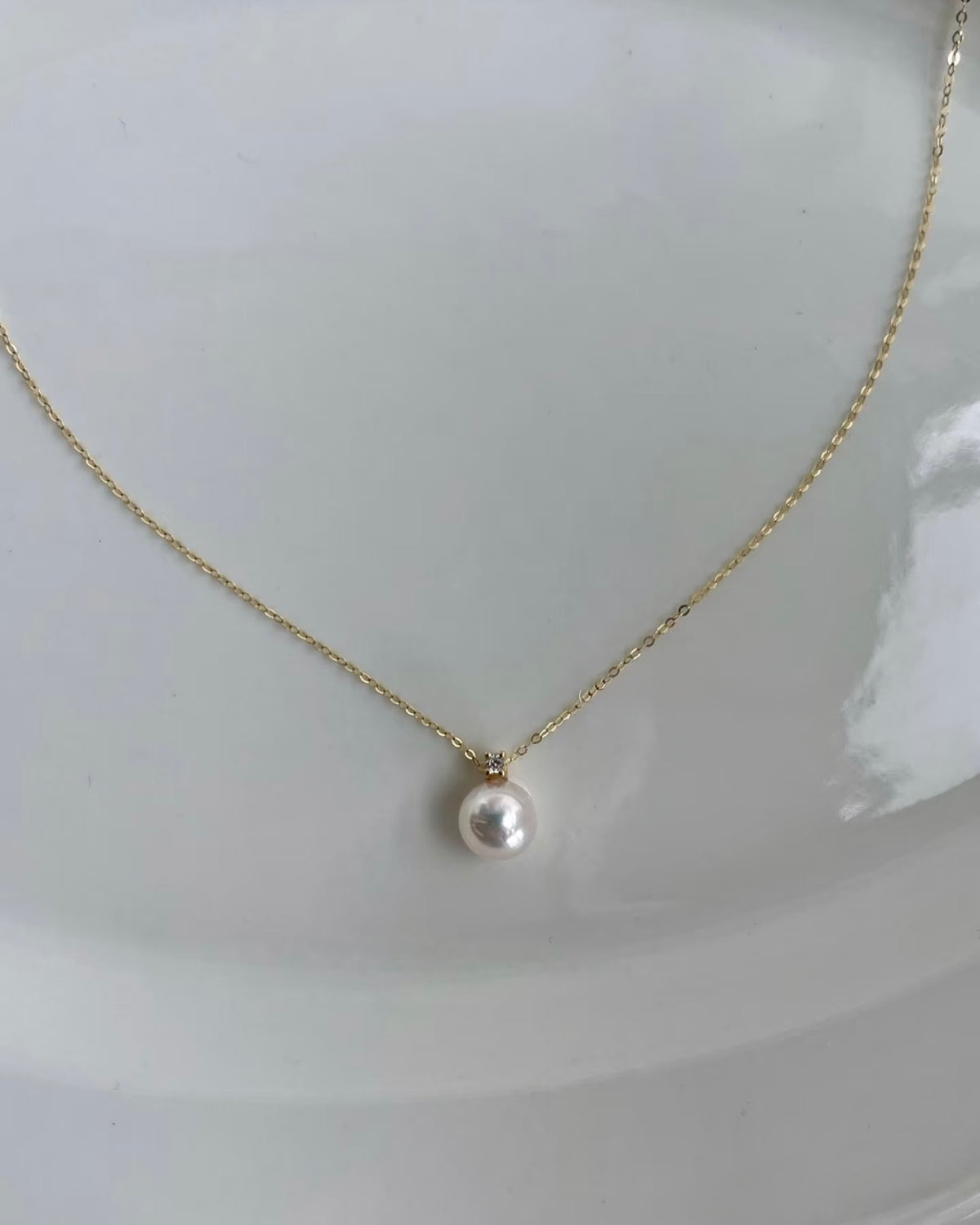 Japanese Akoya pearl and natural diamond necklace with 14K yellow gold chain