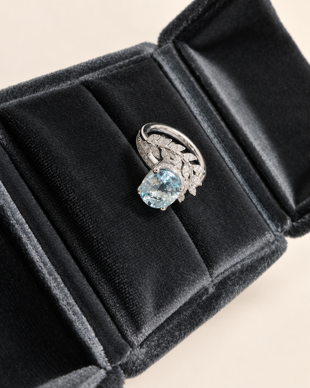 Oval aquamarine ring with lab-grown diamond vine accents in white gold
