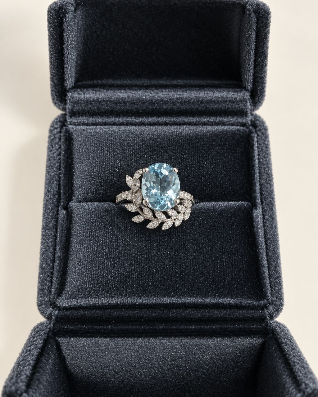 Oval aquamarine ring with lab-grown diamond vine accents in white gold