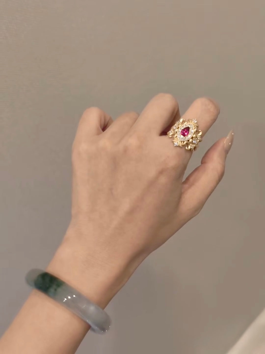 Bespoke 18K yellow gold pear ruby ring with ornate scrollwork and lab-grown diamonds