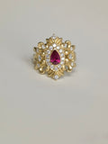 Bespoke 18K yellow gold pear ruby ring with ornate scrollwork and lab-grown diamonds