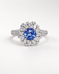Cornflower blue sapphire floral halo ring in 18K gold with lab-grown diamonds, front view