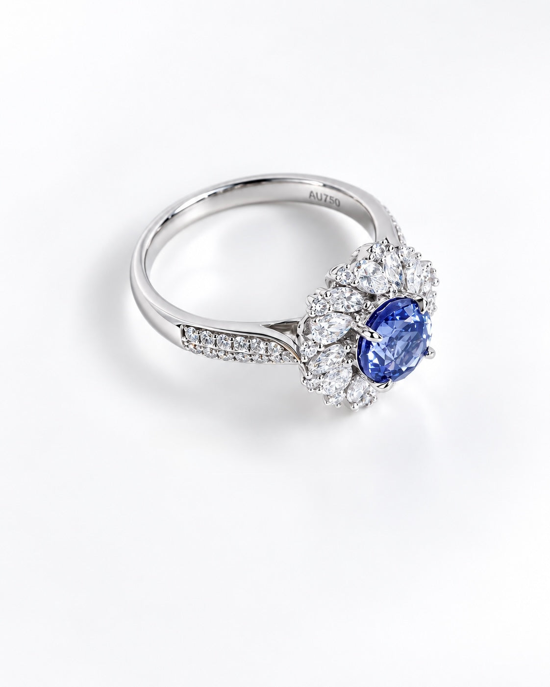Cornflower blue sapphire floral halo ring in 18K gold with lab-grown diamonds, side view