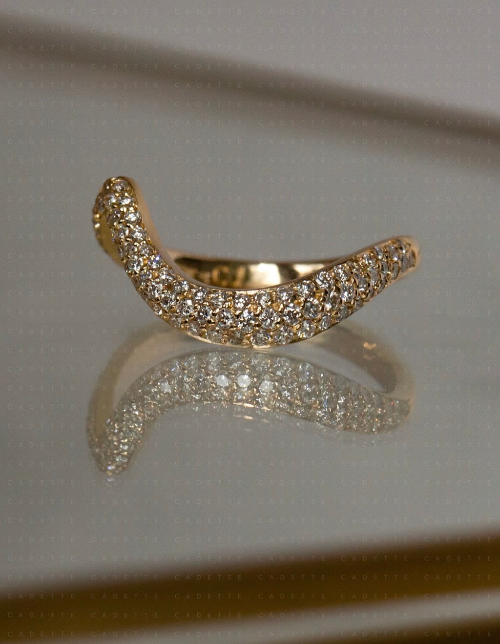 18K yellow gold V-shaped pavé natural diamond stacking band; other rings shown for styling only