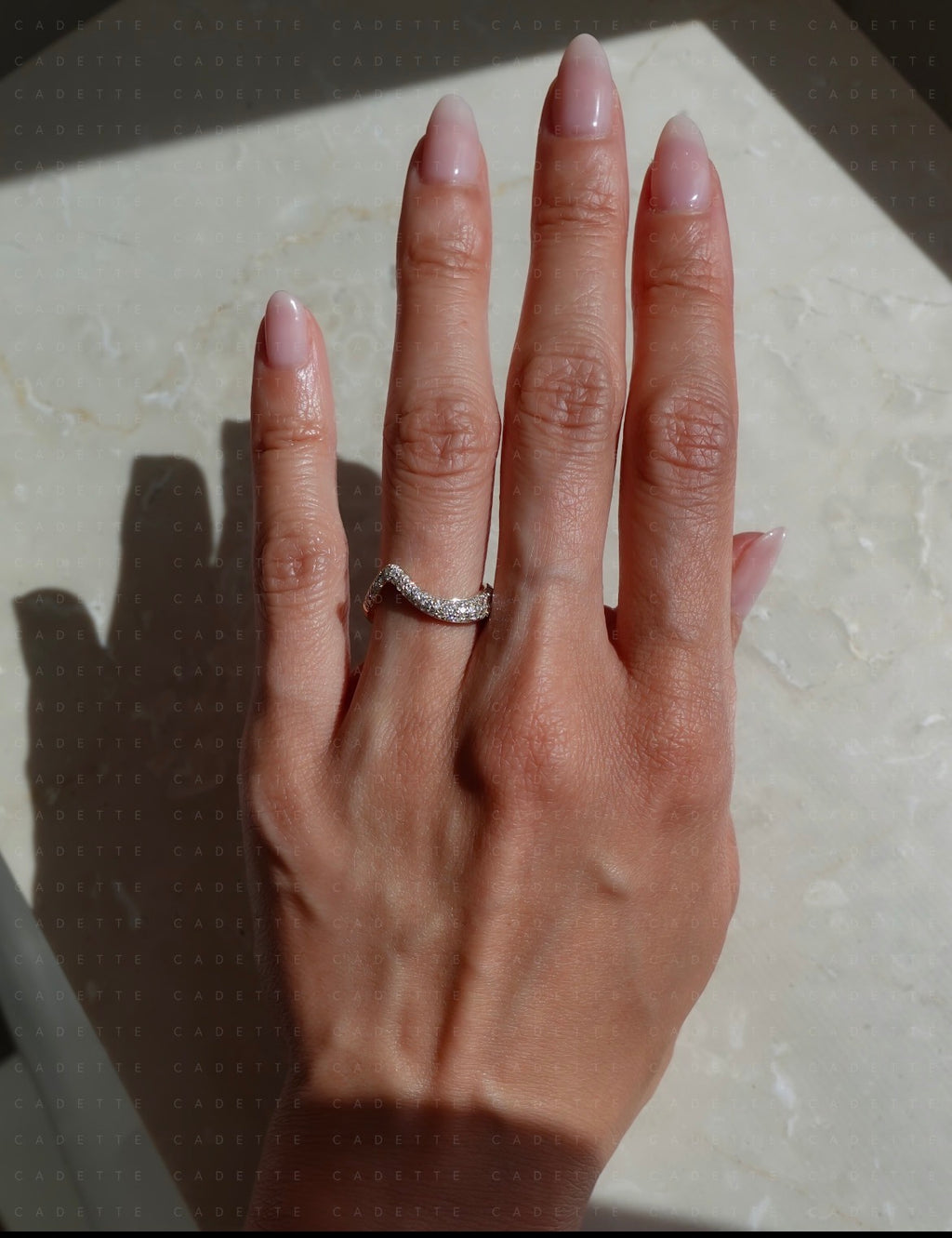 18K yellow gold V-shaped pavé natural diamond stacking band; other rings shown for styling only