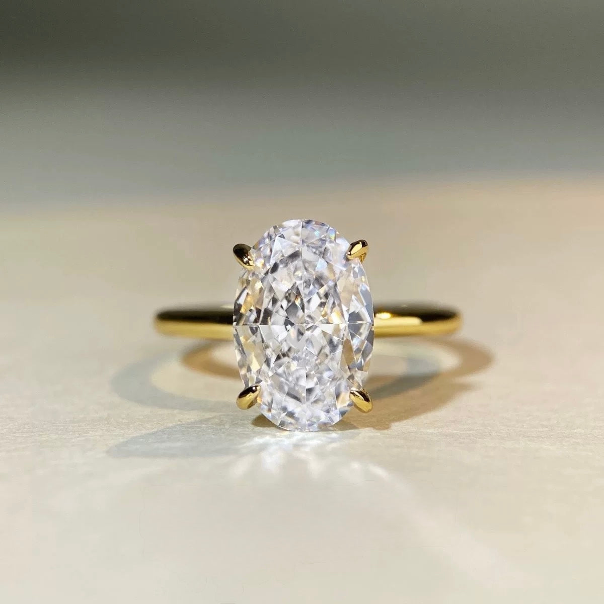 Oval lab-grown diamond hidden halo solitaire ring