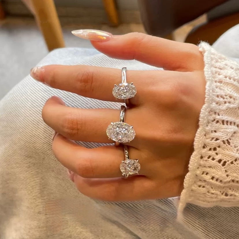 Oval lab-grown diamond hidden halo solitaire ring