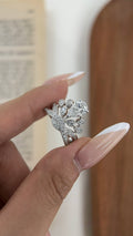Pear-cut lab-grown diamond ring with pavé crossover bands and teardrop accents