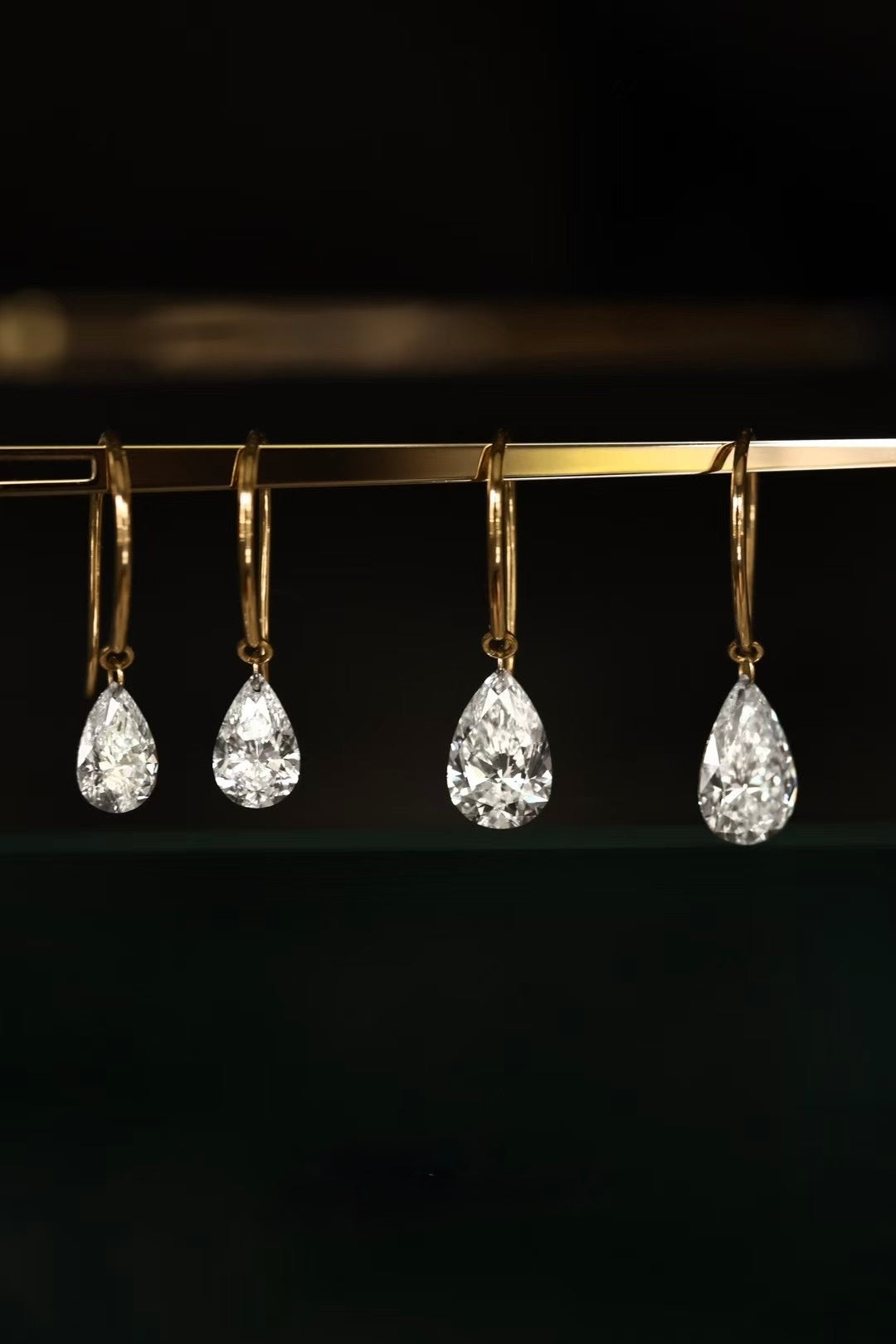 Pear-cut lab-grown diamond drop earrings in yellow gold, view 5