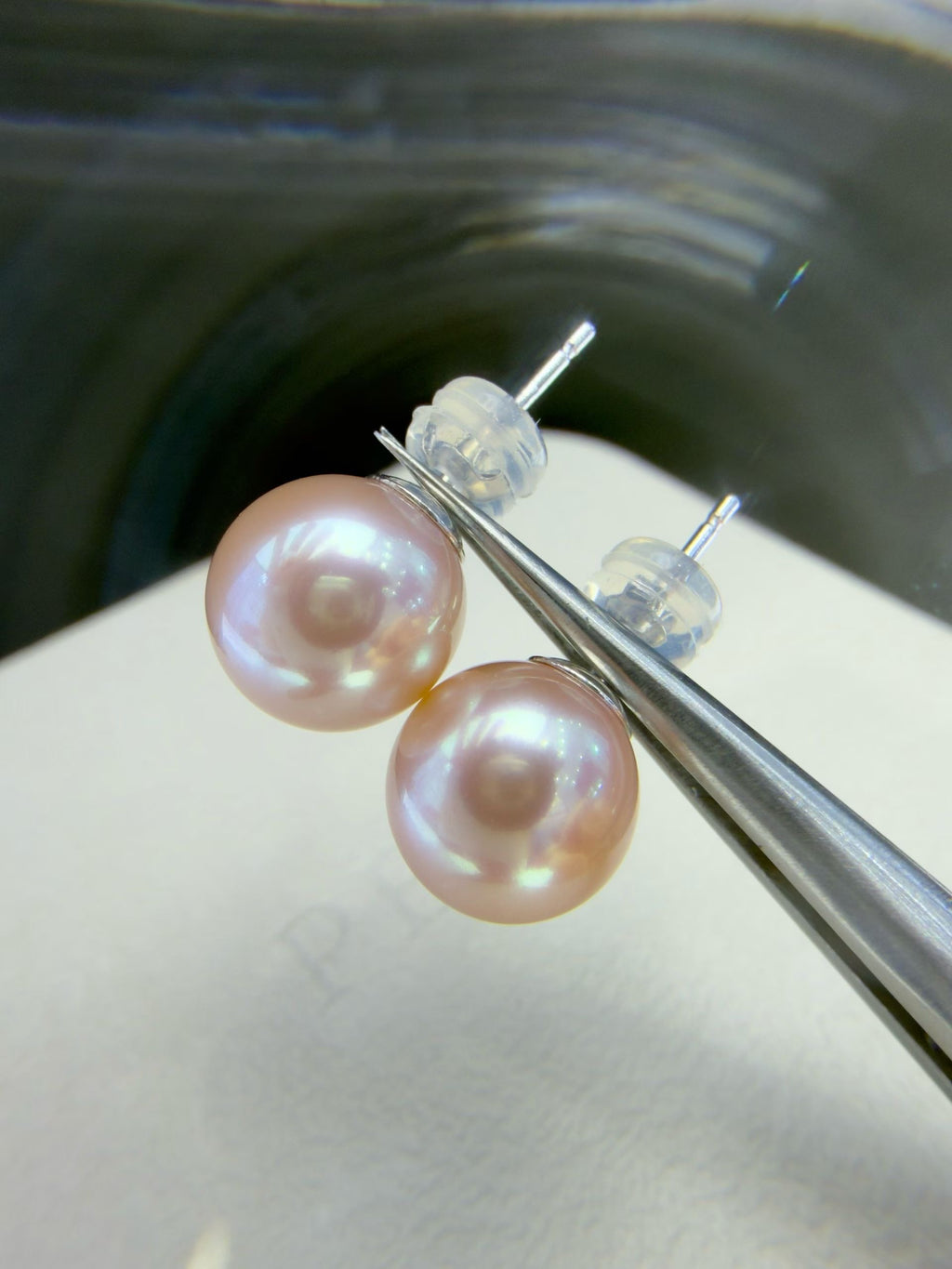 9.5–10mm pink-lavender round freshwater pearl stud earrings with 14K gold posts