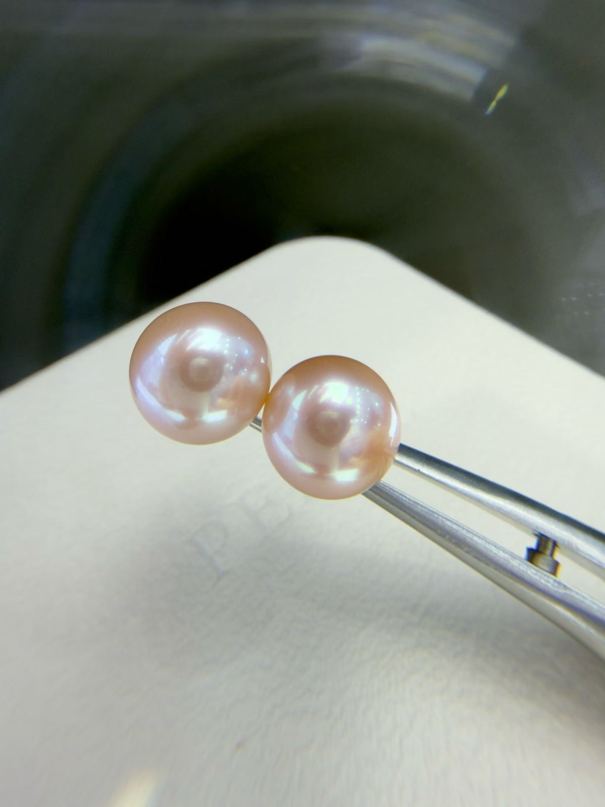 9.5–10mm pink-lavender round freshwater pearl stud earrings with 14K gold posts