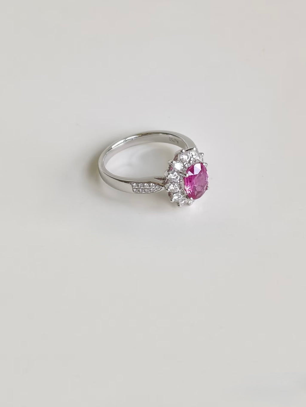 Side view of pink sapphire and lab-grown diamond ring