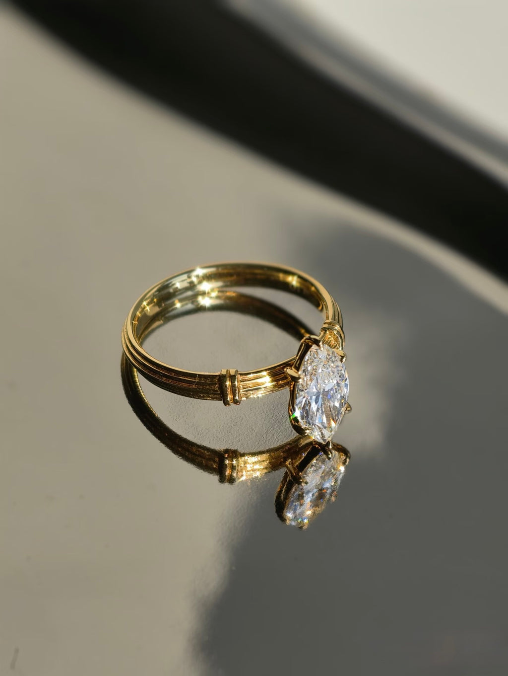 Marquise lab-grown diamond ring with Roman column inspired yellow gold band
