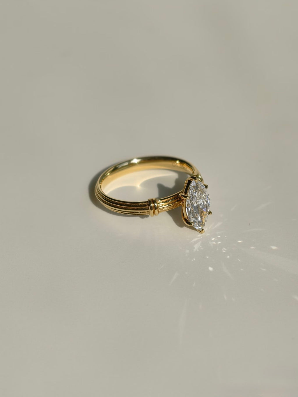Marquise lab-grown diamond ring with Roman column inspired yellow gold band