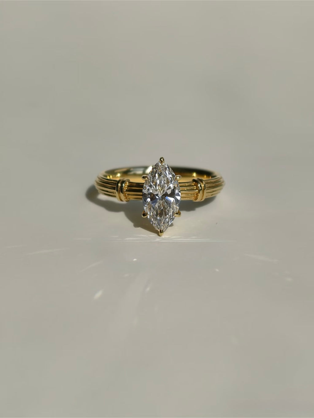 Marquise lab-grown diamond ring with Roman column inspired yellow gold band