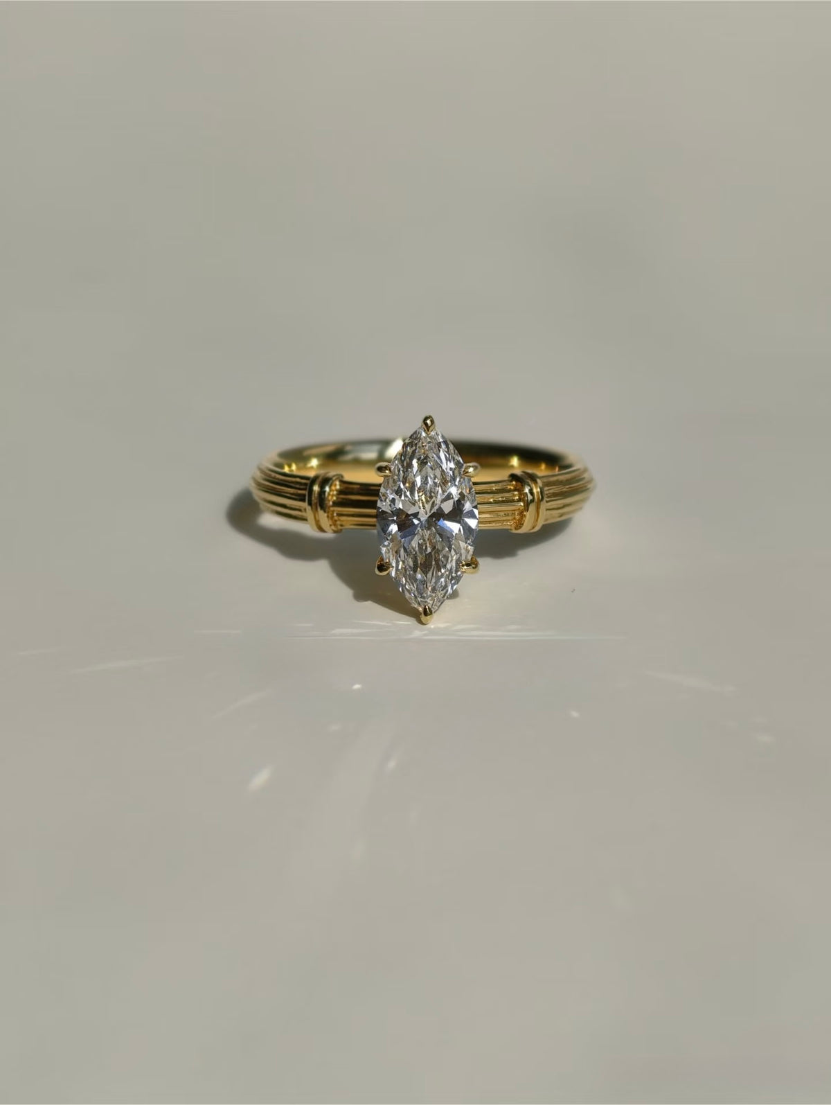 Marquise lab-grown diamond ring with Roman column inspired yellow gold band