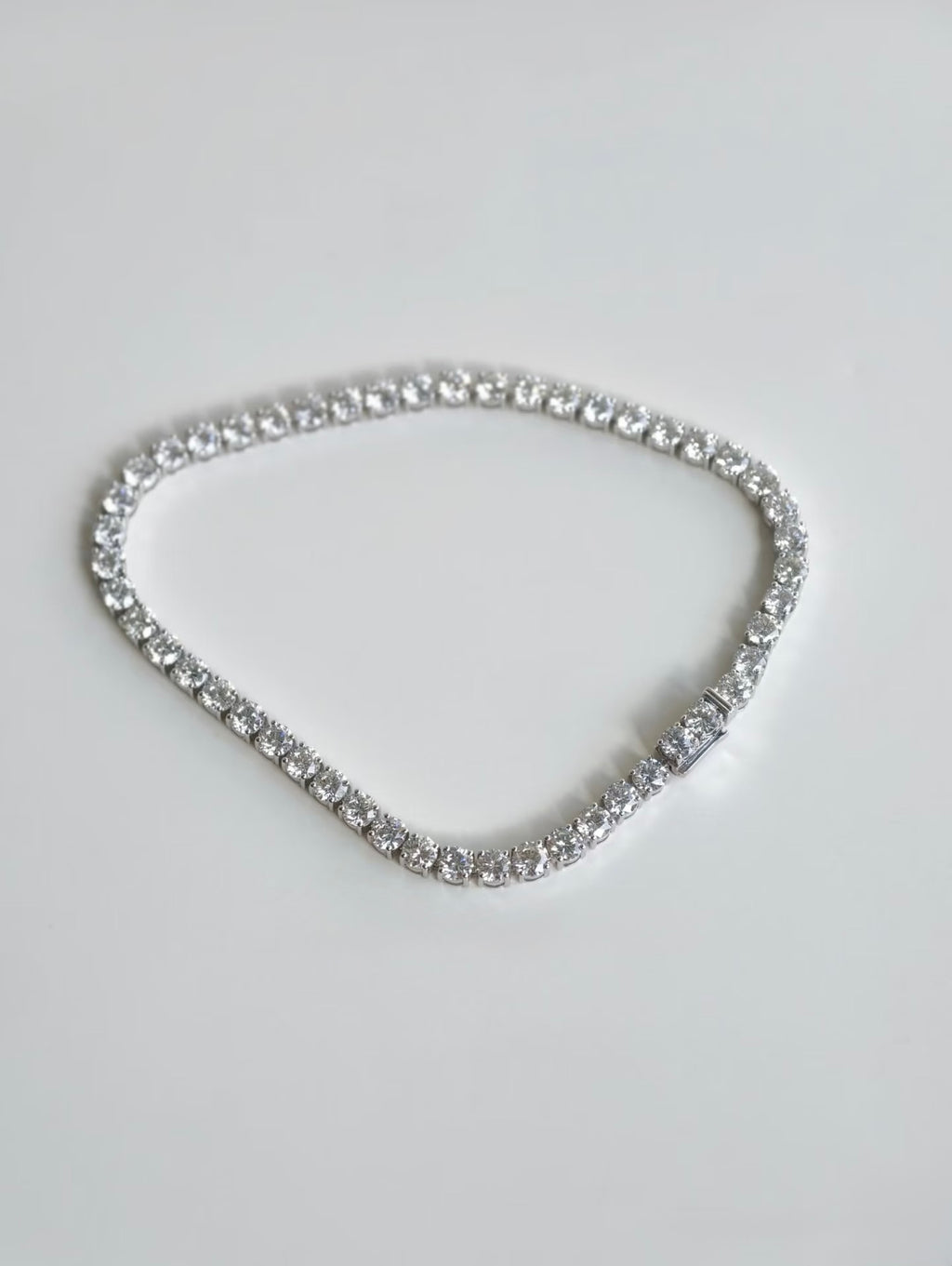 White gold lab-grown diamond tennis bracelet, overhead view