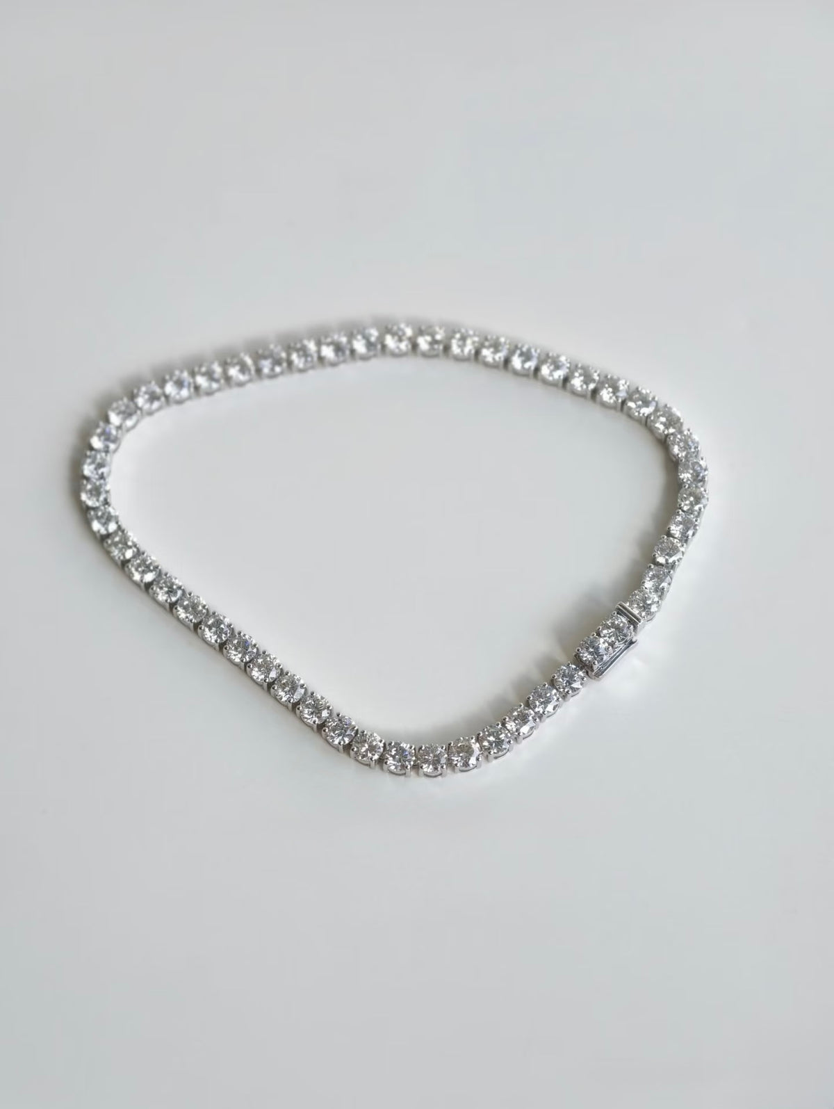 White gold lab-grown diamond tennis bracelet, overhead view