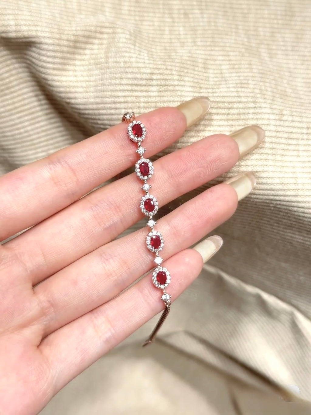 Ruby and natural diamond halo bracelet in 18K rose gold