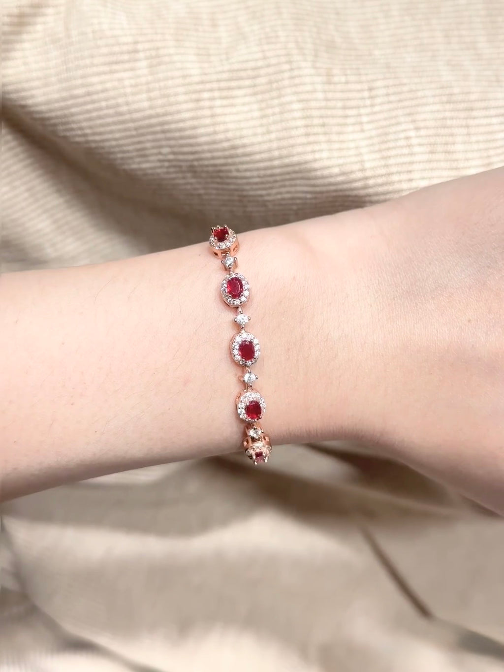 Ruby and natural diamond halo bracelet in 18K rose gold