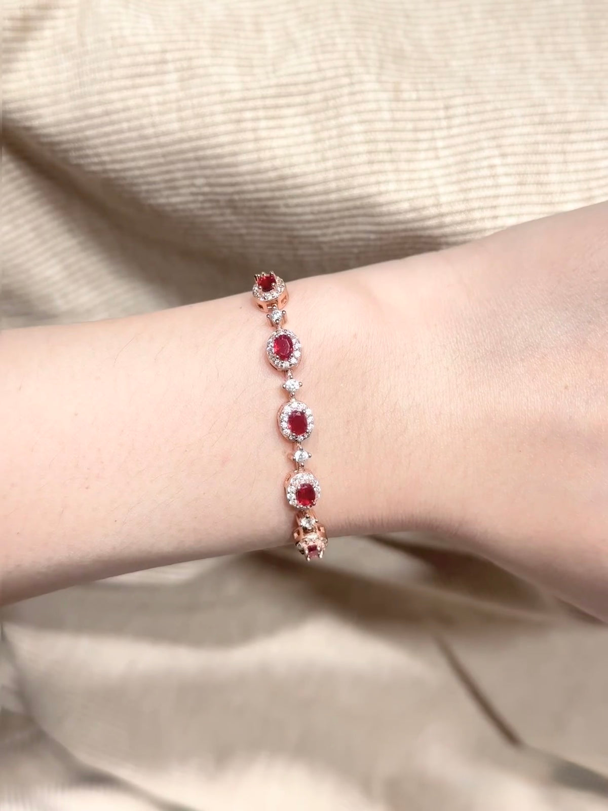 Ruby and natural diamond halo bracelet in 18K rose gold