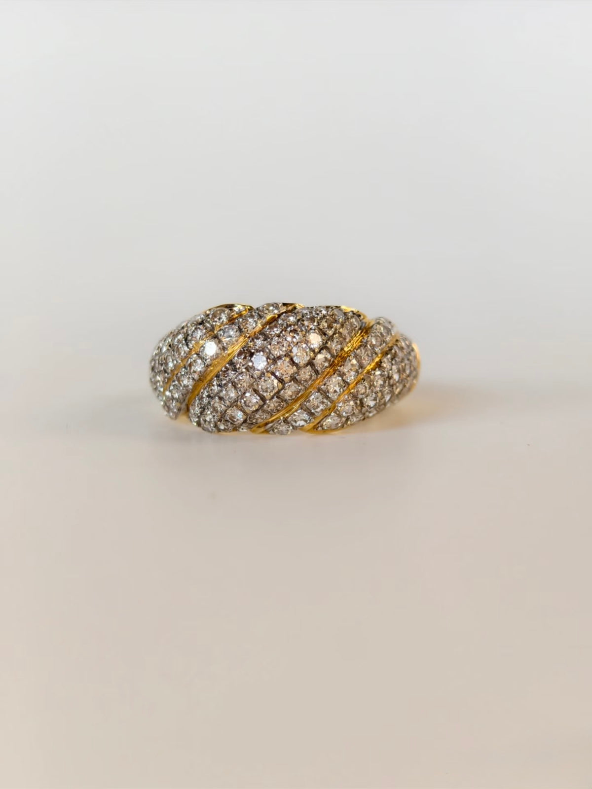 Vintage-inspired 18K yellow gold bombé twist ring with pavé natural diamonds